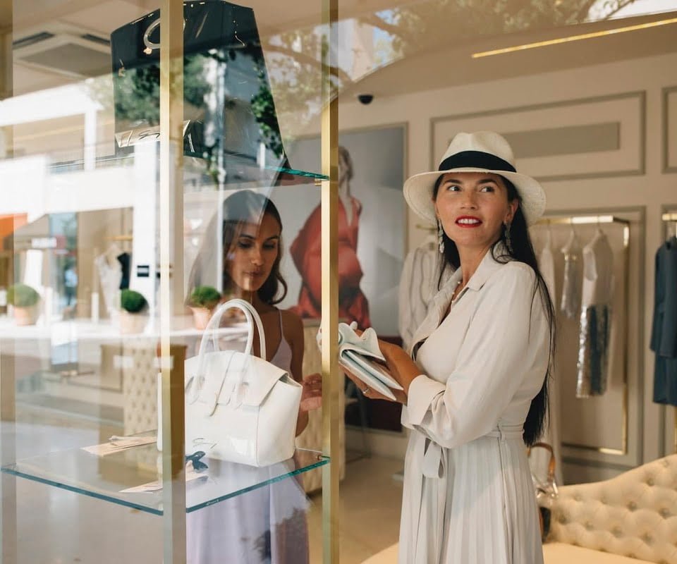 Woman shopping for handbags