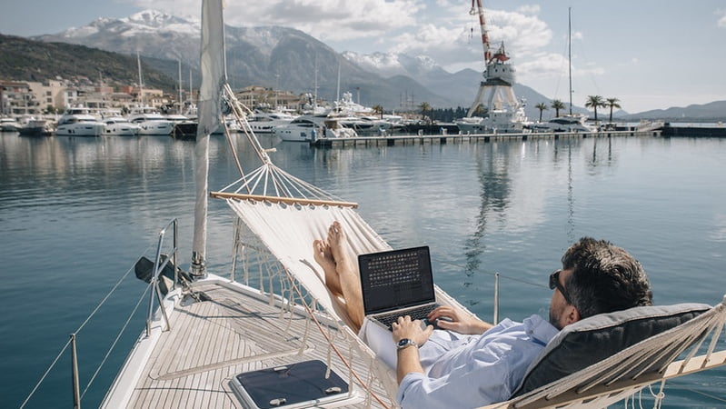 Man working from yacht
