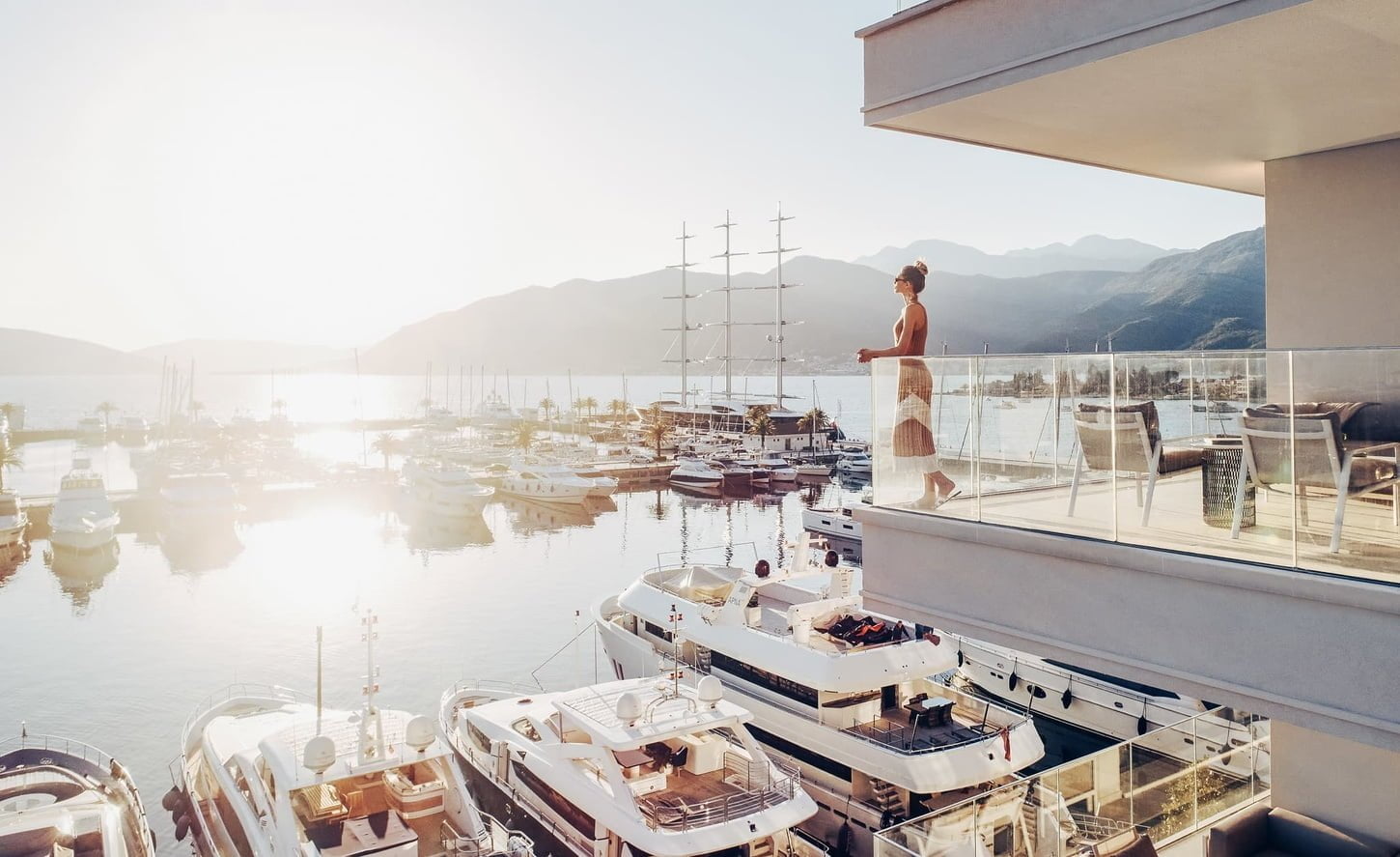 Woman overlooking marina in Porto Montenegro