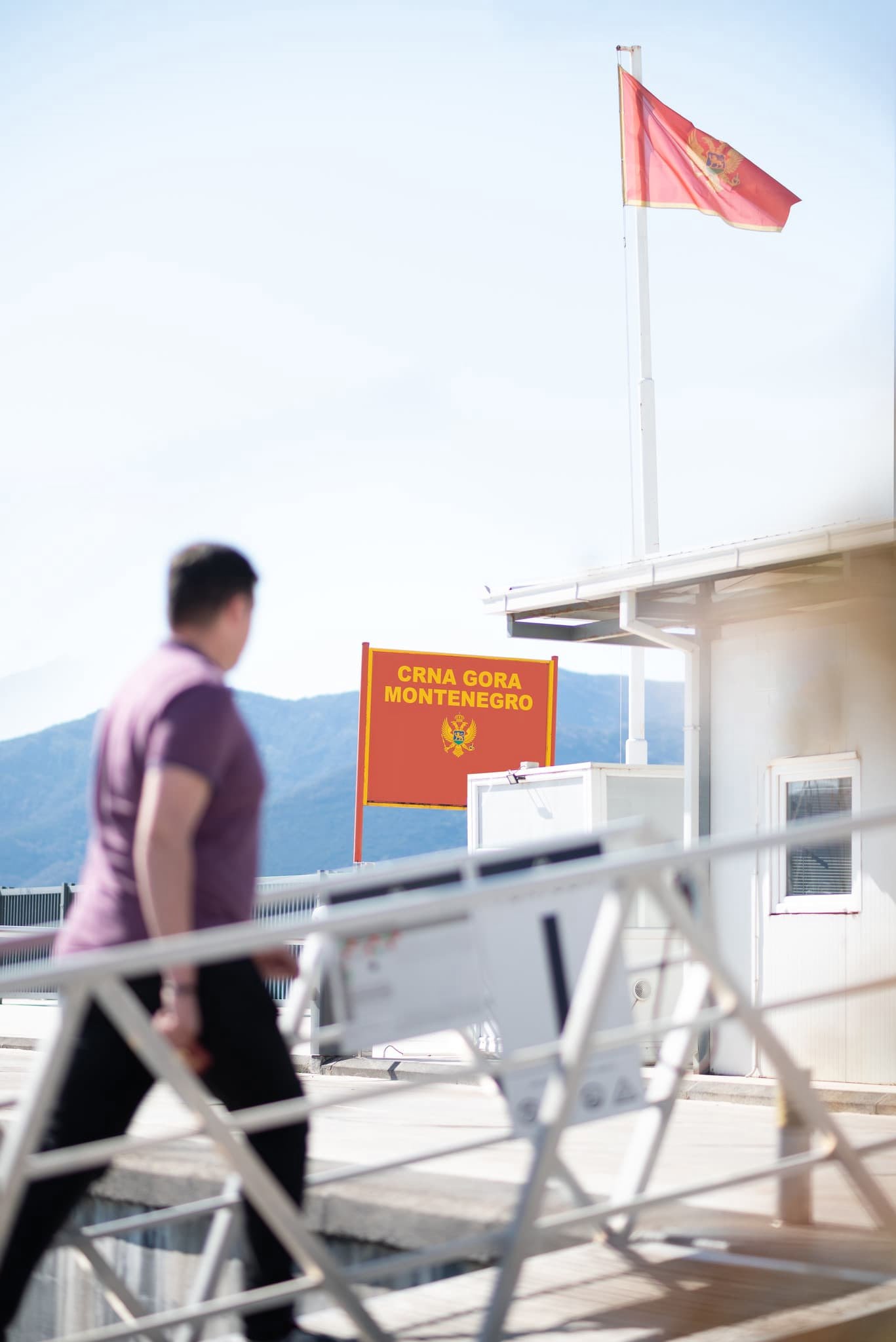 Man walking in porto montenegro