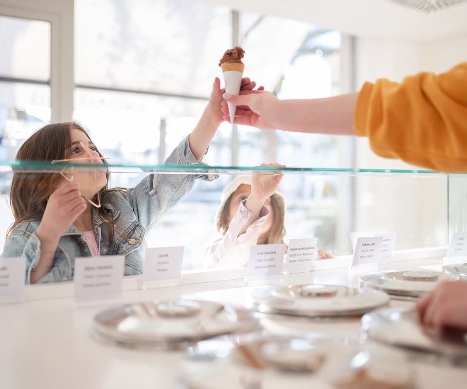 Children purchasing ice cream