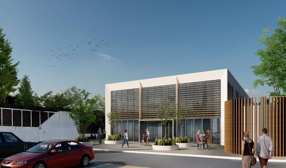 Adriatic Business Club in Porto Montenegro, captured from an angle that highlights the sleek lines and modern architecture of the building, with large glass windows reflecting the surrounding greenery.