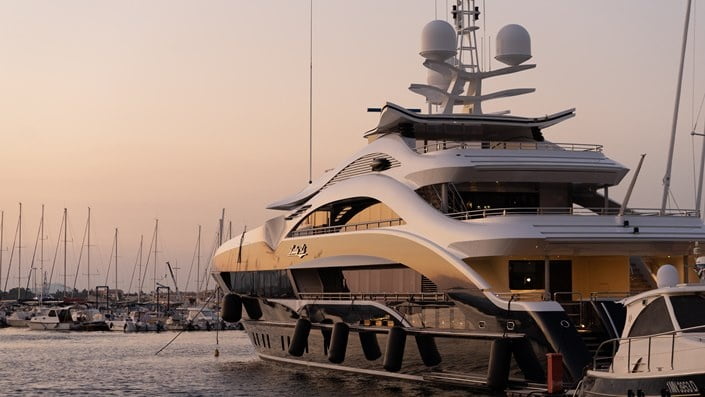Big yacht sailing in sunset