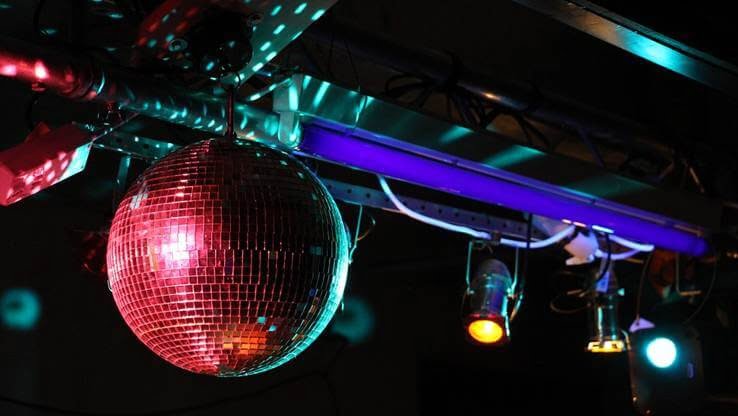 Disco ball and lights hanging in the club.