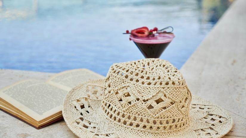 hat pool drink book