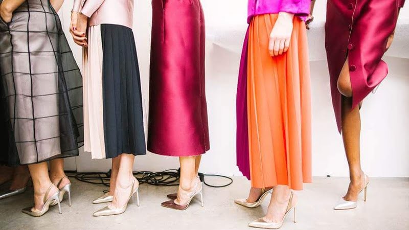 Models wearing high fashion garments