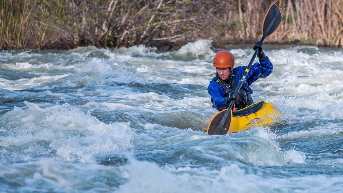 Man kayaking