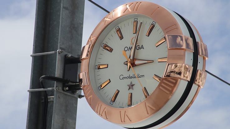 Omega commercial sign
