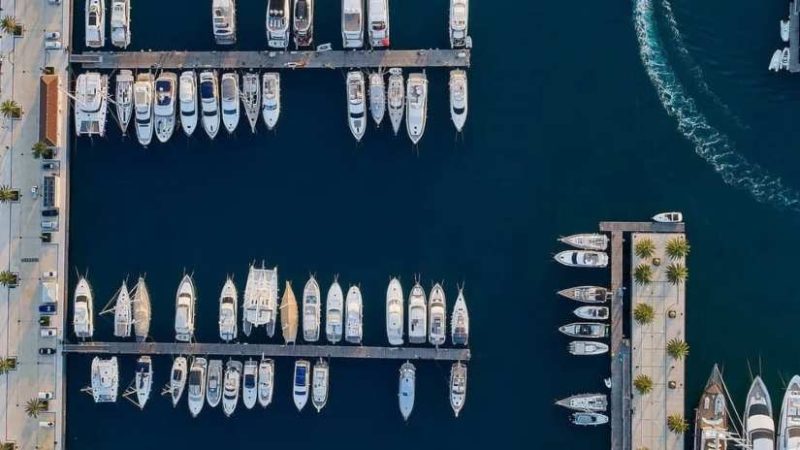 Porto Montenegro marina showcasing its premium facilities and amenities, including luxury yachts and exclusive services.