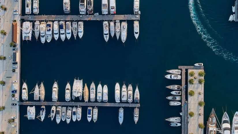 Porto Montenegro marina showcasing its premium facilities and amenities, including luxury yachts and exclusive services.
