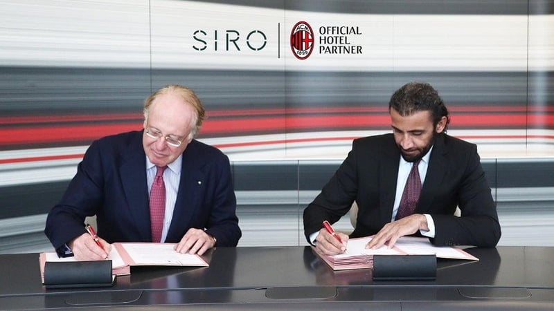 two guys signing the contract