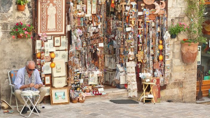 A man selling Montenegrin souvenirs