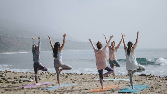 Yoga class on the beach