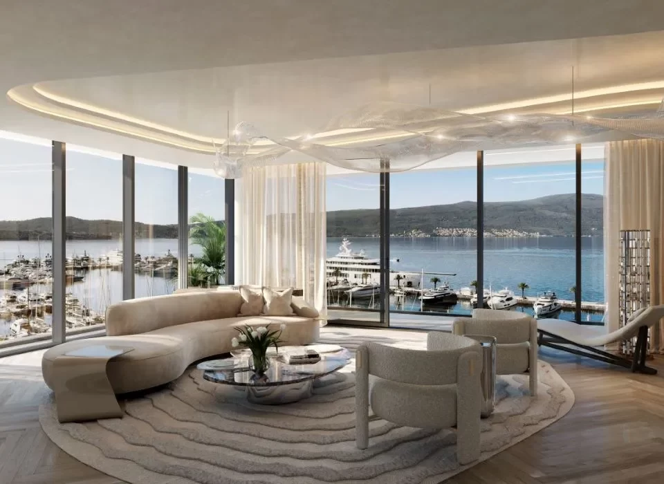 Living room with a tranquil waterfront view in Porto Montenegro.